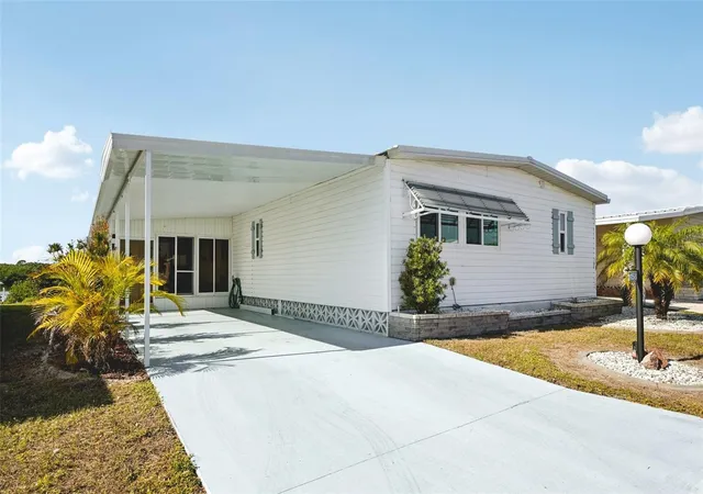 Photo 1 of Manufactured home for sale at 156 Martinique Rd, North Port, FL 34287 | MLS# A4676518 | Listing updated on 2026-09-20