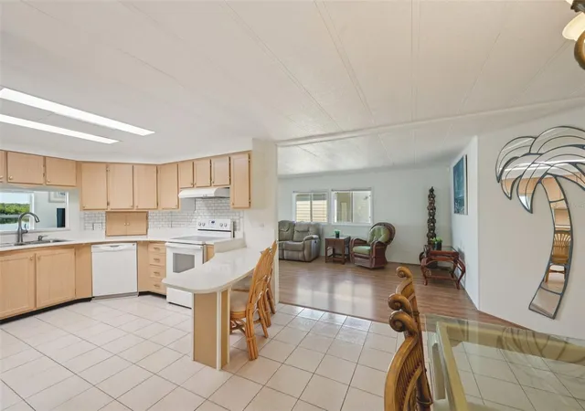 Photo 3 of Manufactured home for sale at 156 Martinique Rd, North Port, FL 34287 | MLS# A4676518 | Listing updated on 2026-09-20