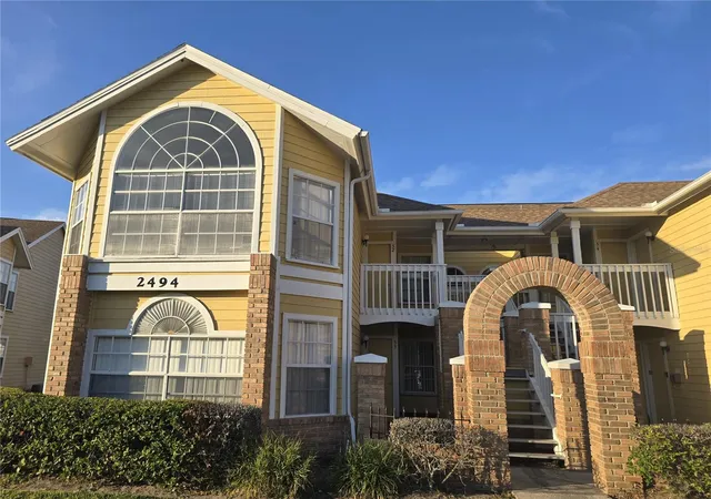 Photo 1 of Condo for sale at 2494 Sweetwater Clb Cir #52, Kissimmee, FL 34746 | MLS# O6370306 | Listing updated on 2026-10-23
