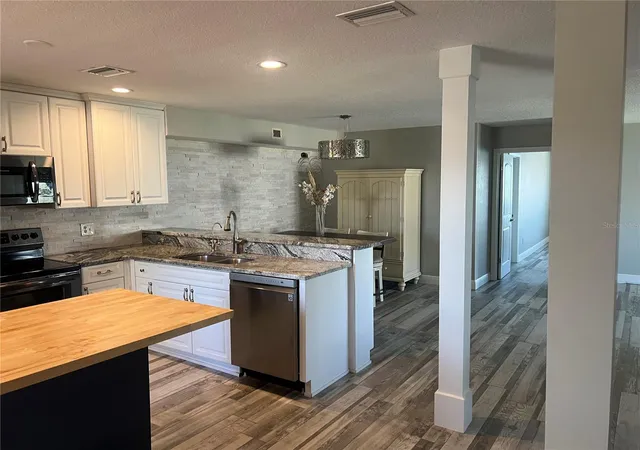 Listing Photo 4 - Condo for sale in building located at 8211 Brent St, Port Richey, FL 34668 - Unit #828