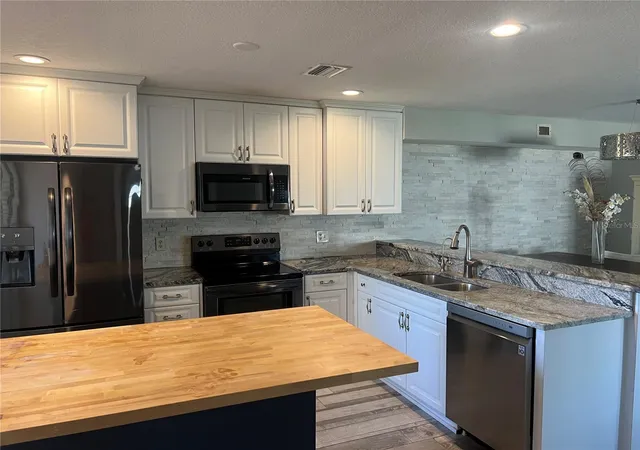 Listing Photo 5 - Condo for sale in building located at 8211 Brent St, Port Richey, FL 34668 - Unit #828
