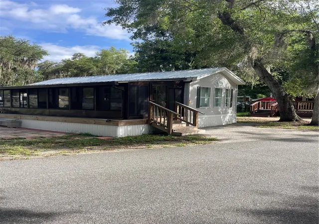 3rd image of 25144 Ne 140Th Loop, Fort Mc Coy, FL 32134 | MLS# OM716027