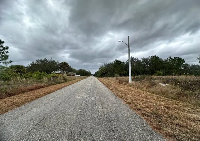 Photo 1 of Land for sale at 1610 Scott Ave, Lehigh Acres, FL 33972 | MLS# FC315059 | Listing updated on 2026-10-23
