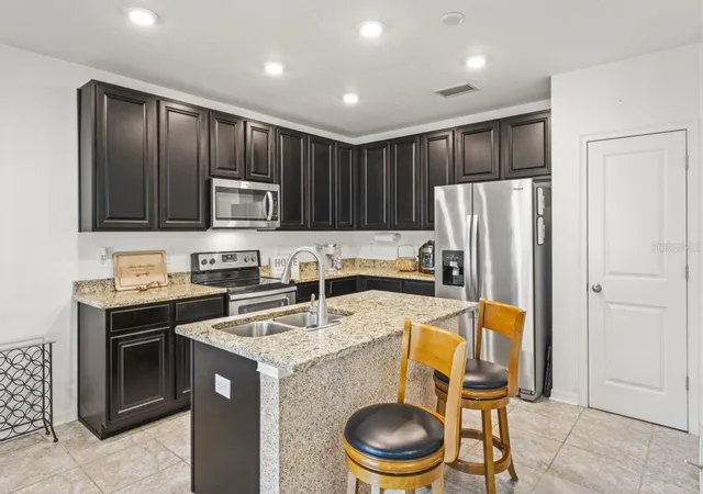Photo 5 of Single family home for sale at 571 Old Windsor Way, Spring Hill, FL 34609 | MLS# TB8461392 | Listing updated on 2026-09-03