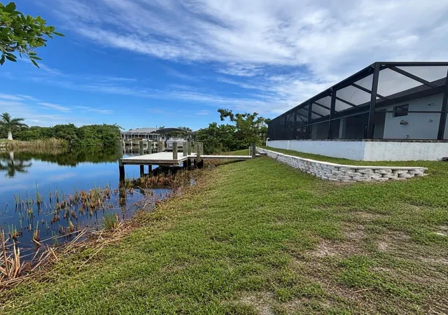 Photo 1 of Single family home for sale at 14267 Montmarte Ave, Port Charlotte, FL 33981 | MLS# D6145458 | Listing updated on 2026-10-06