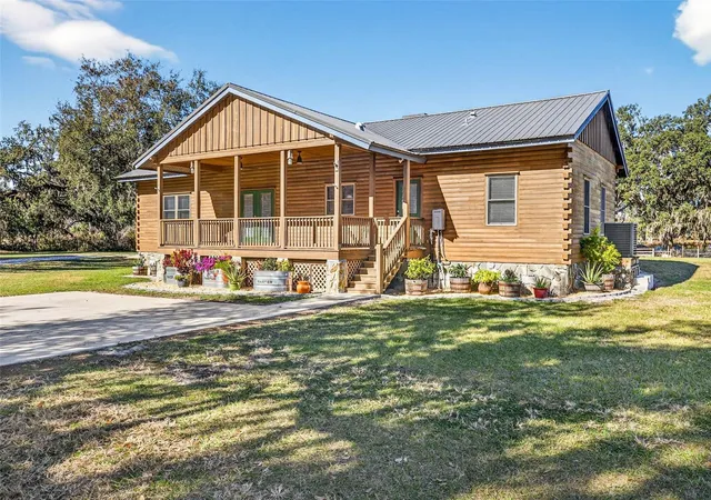 Photo 3 of Single family home for sale at 6750 Sutton Oaks Ln, Zephyrhills, FL 33541 | MLS# TB8461931 | Listing updated on 2026-09-04