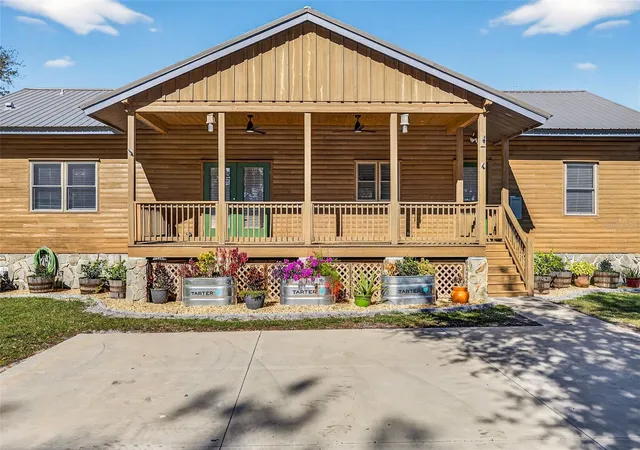 Photo 4 of Single family home for sale at 6750 Sutton Oaks Ln, Zephyrhills, FL 33541 | MLS# TB8461931 | Listing updated on 2026-09-04