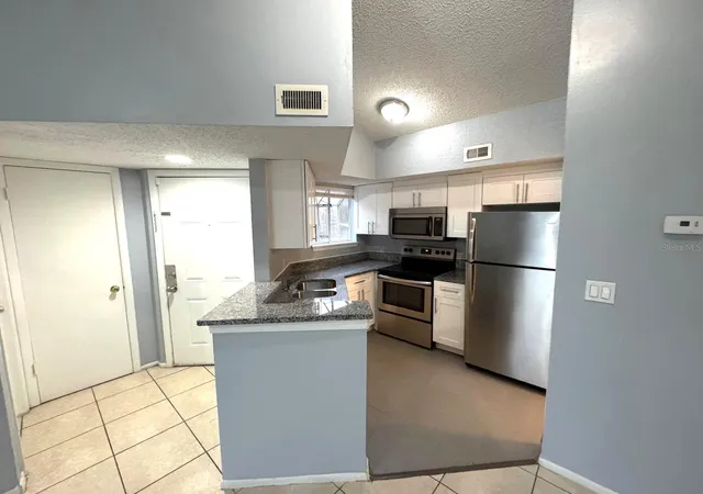 Photo 3 of Condo for sale at 1924 Lake Atriums Cir #56, Orlando, FL 32839 | MLS# O6371841 | Listing updated on 2026-08-21