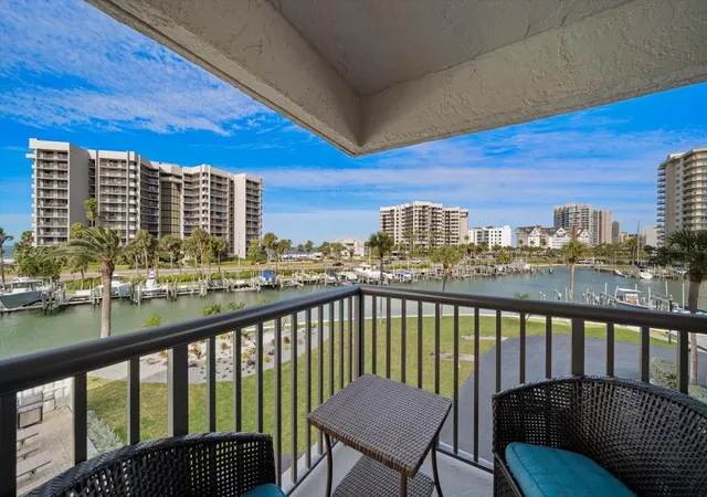 Listing Photo 1 - Condo for sale in building located at 1651 Sand Key Estates Ct, Clearwater, FL 33767 - Unit #28