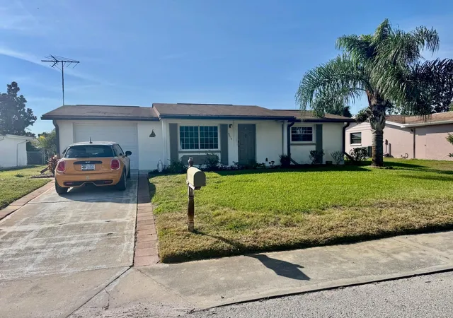 Photo 1 of Single family home for sale at 9617 Lake Chrise Ln, Port Richey, FL 34668 | MLS# W7881892 | Listing updated on 2026-09-30
