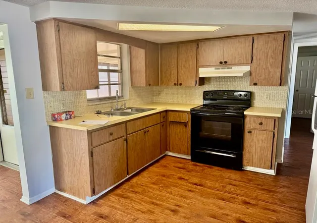 Photo 2 of Single family home for sale at 9617 Lake Chrise Ln, Port Richey, FL 34668 | MLS# W7881892 | Listing updated on 2026-09-30