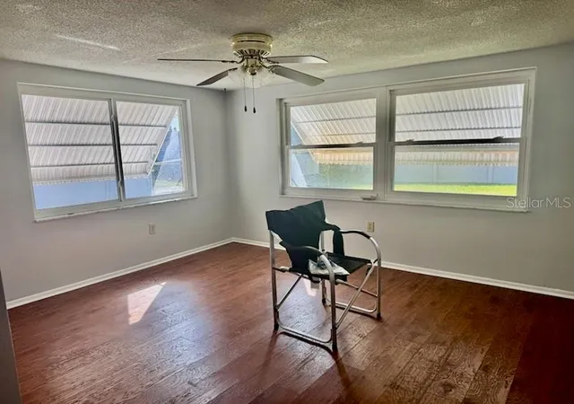 Photo 3 of Single family home for sale at 9617 Lake Chrise Ln, Port Richey, FL 34668 | MLS# W7881892 | Listing updated on 2026-09-30