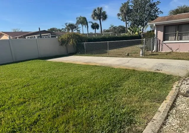 Photo 4 of Single family home for sale at 9617 Lake Chrise Ln, Port Richey, FL 34668 | MLS# W7881892 | Listing updated on 2026-09-30
