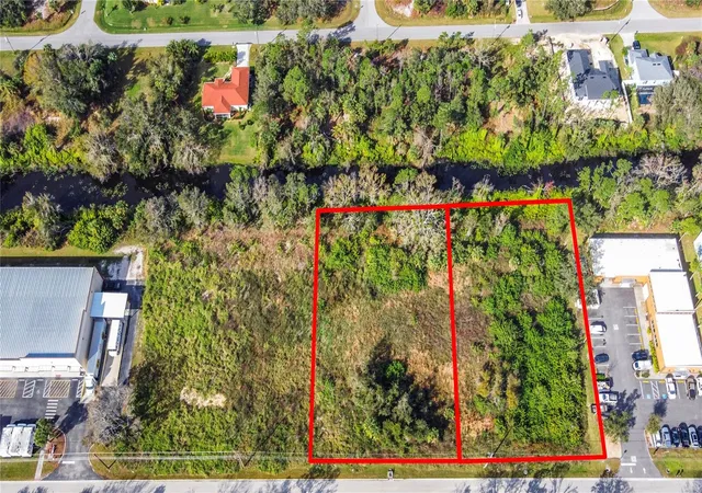 1st image of 2725 Commerce Pkwy, North Port, FL 34289 | MLS# A4677640