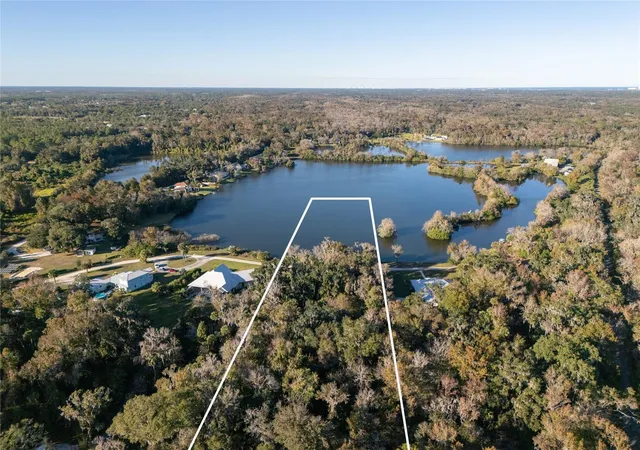 5th image of 2750 Pearl Lake Trl, New Smyrna Beach, FL 32168 | MLS# FC315207