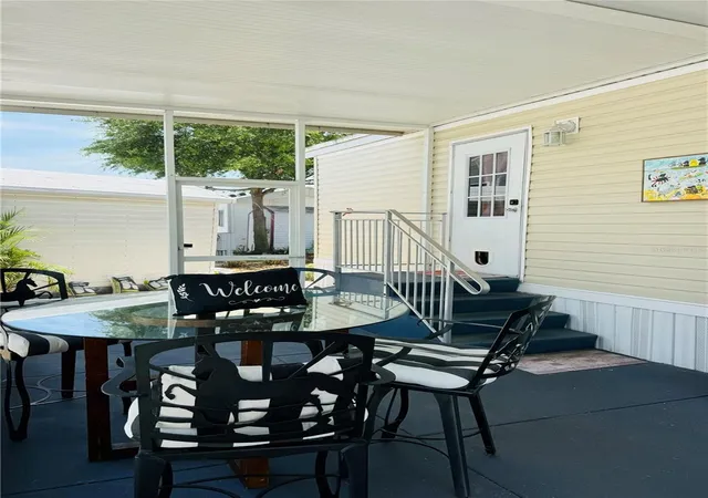 Photo 3 of Manufactured home for sale at 300 Royal Troon Loop, Davenport, FL 33837 | MLS# O6372745 | Listing updated on 2026-07-21