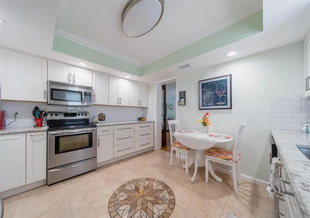 Listing Photo 5 - Condo for sale in building located at 5020 Brittany Dr S, St. Petersburg, FL 33715 - Unit #324