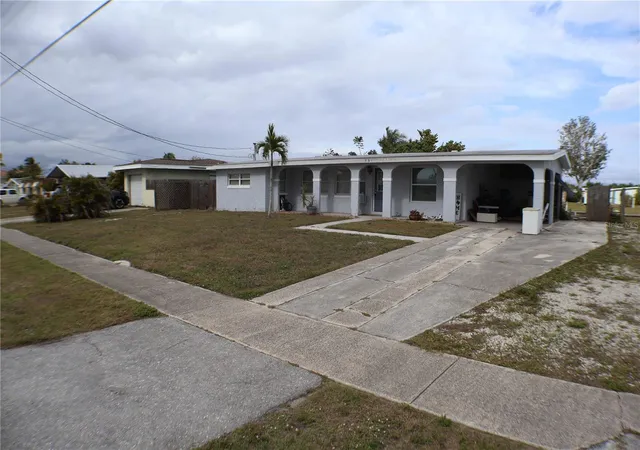 1st image of 731 Conreid Dr Ne, Port Charlotte, FL 33952 | MLS# A4677909