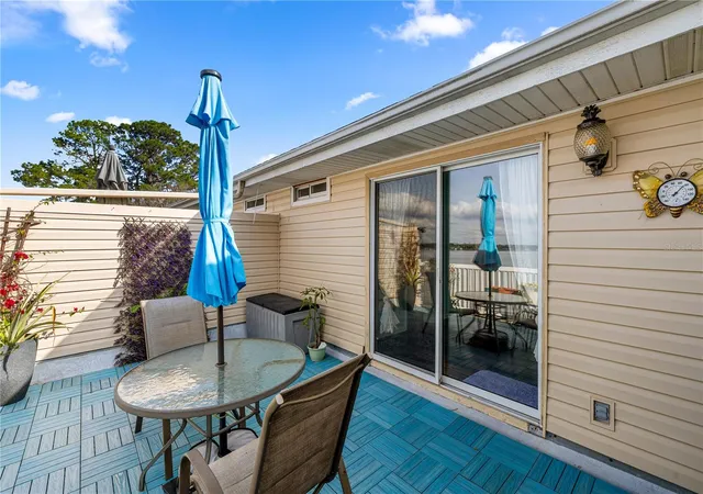 Photo 3 of Condo for sale at 11001 SE Sunset Harbor Rd #B14, Summerfield, FL 34491 | MLS# OM716522 | Listing updated on 2026-09-30
