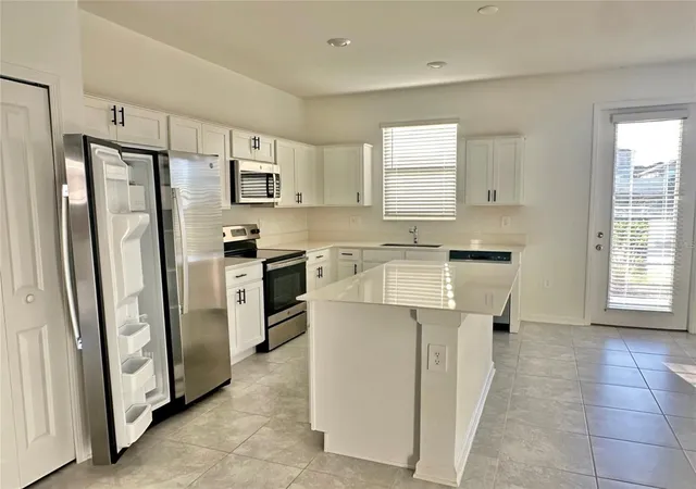 Photo 2 of Townhouse for sale at 390 Bogey Dr, Davenport, FL 33896 | MLS# S5141635 | Listing updated on 2026-10-04