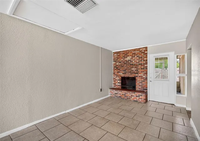 Photo 3 of House for sale at 708 N Saint Clair Abrams Ave, Tavares, FL 32778 | MLS# O6373379 | Listing updated on 2026-10-07