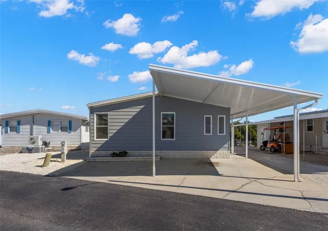 Photo 2 of Manufactured home for sale at 7113 Mount Piney Rd Ne #719, Saint Petersburg, FL 33702 | MLS# TB8464122 | Listing updated on 2026-07-18