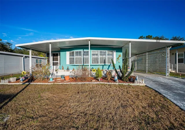 Photo 1 of Manufactured home for sale at 3318 Carnation Ln, Zephyrhills, FL 33541 | MLS# TB8464361 | Listing updated on 2026-09-24