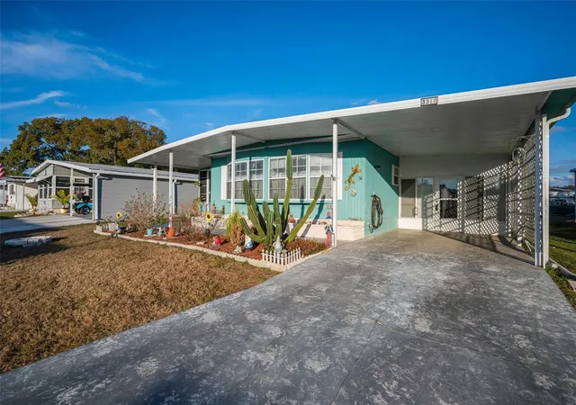 Photo 3 of Manufactured home for sale at 3318 Carnation Ln, Zephyrhills, FL 33541 | MLS# TB8464361 | Listing updated on 2026-09-24