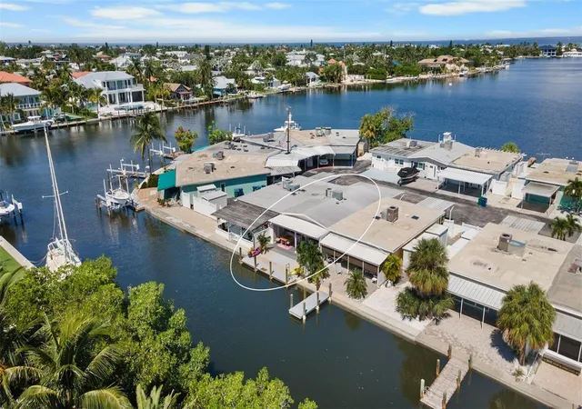 Photo 1 of Townhouse for sale at 26 Seaside Ct, Holmes Beach, FL 34217 | MLS# A4678364 | Listing updated on 2026-09-23