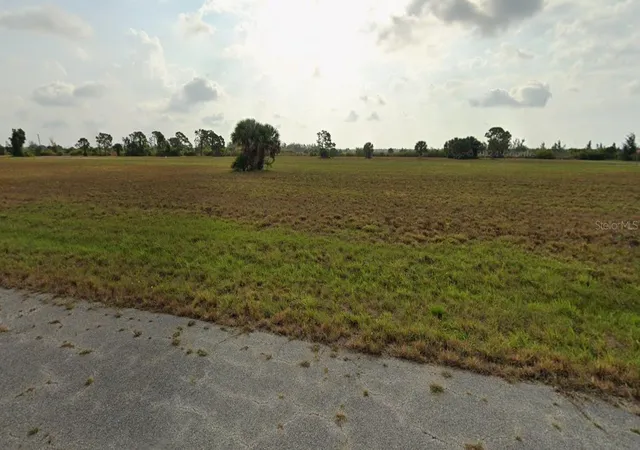Photo 1 of Land for sale at 24 Chinaberry Way, Placida, FL 33946 | MLS# C7520272 | Listing updated on 2026-01-23