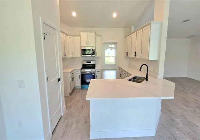 Photo 4 of Single family home for sale at 2239 N Biscayne Dr, North Port, FL 34291 | MLS# A4678795 | Listing updated on 2026-09-13