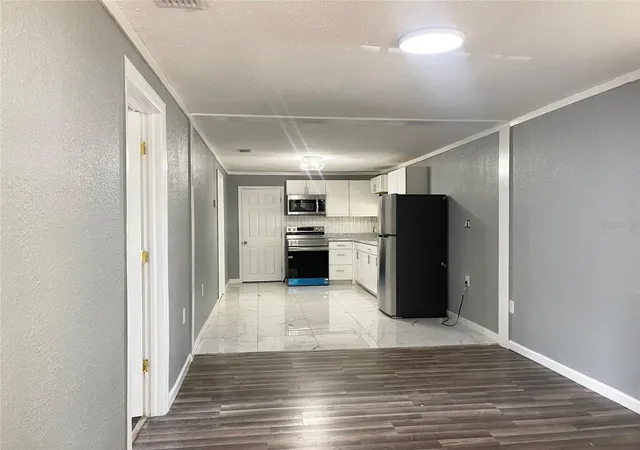 Photo 3 of Single family home for sale at 630 N Nashua Ave, Fort Meade, FL 33841 | MLS# O6374740 | Listing updated on 2026-09-04