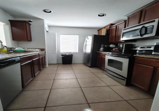 Photo 3 of Townhouse for sale at 9871 Trumpet Vine Loop, Trinity, FL 34655 | MLS# S5142070 | Listing updated on 2026-09-04