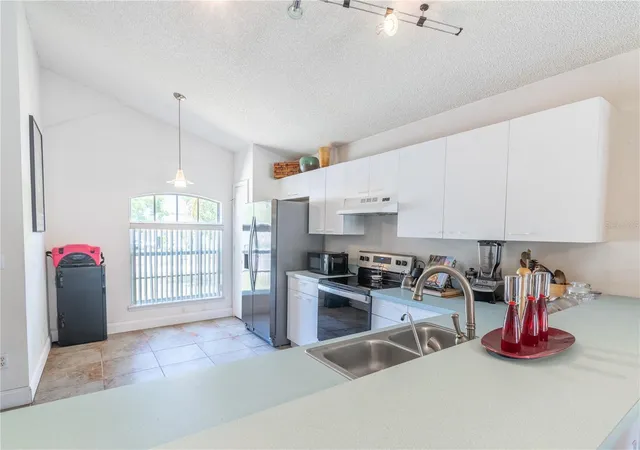 Photo 4 of Single family home for sale at 5501 Chatham Woods Ct, Orlando, FL 32808 | MLS# O6375450 | Listing updated on 2026-10-20
