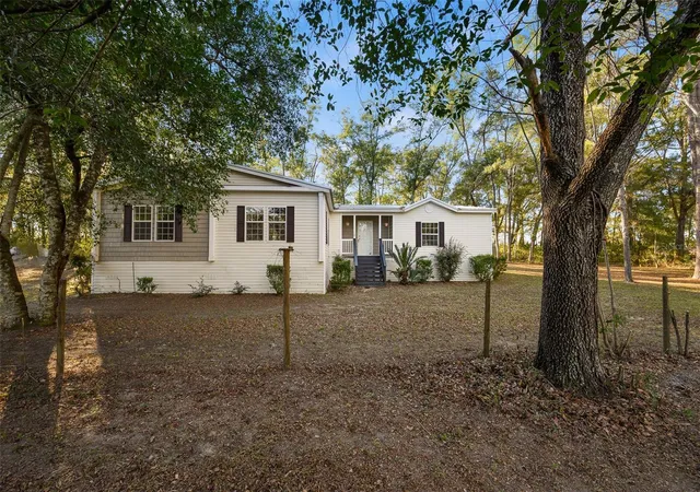 Photo 2 of Manufactured home for sale at 13076 Sw 154th Street, Archer, FL 32618 | MLS# GC536784 | Listing updated on 2026-09-16