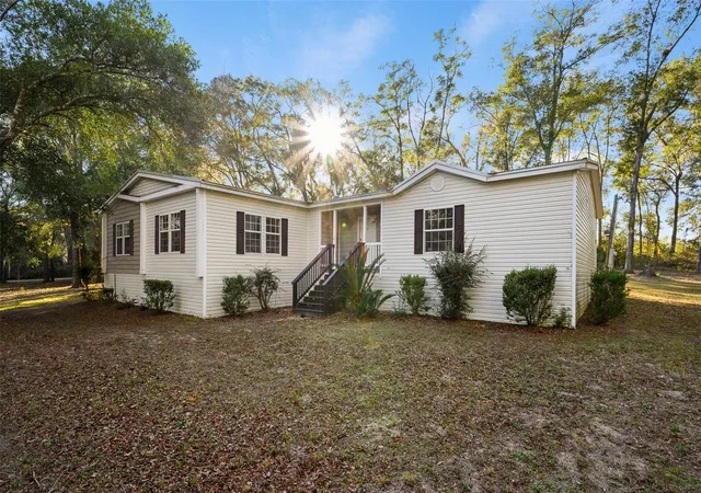 Photo 3 of Manufactured home for sale at 13076 Sw 154th Street, Archer, FL 32618 | MLS# GC536784 | Listing updated on 2026-09-16