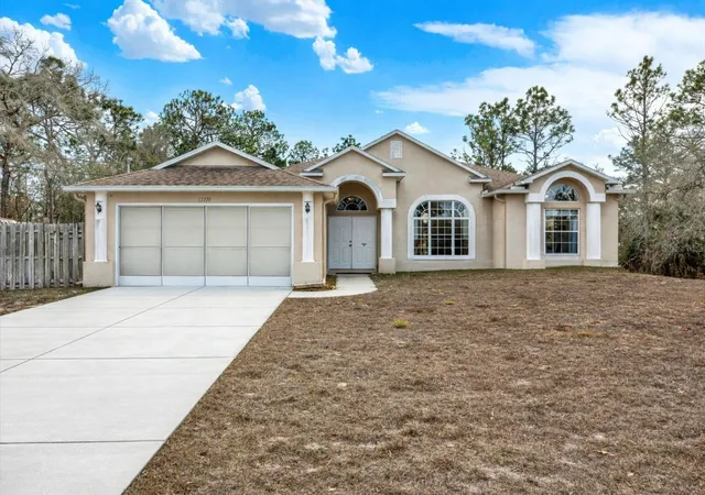 1st image of 12270 Piping Plover Ave, Weeki Wachee, FL 34614 | MLS# W7882326