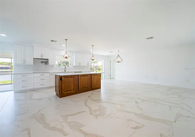 3rd image of 13797 Pinecrest Dr, Largo, FL 33774 | MLS# TB8467510