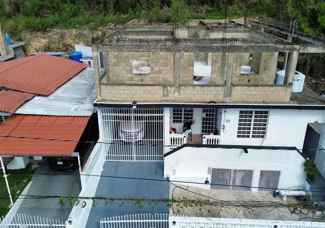 Photo 2 of Townhouse for sale at 26 Bo Factor 1 Parcelas Animas #399 Calle 26, Arecibo, PR 00612 | MLS# PR9118723 | Listing updated on 2026-01-28