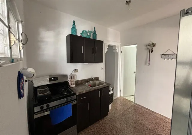 Photo 4 of Townhouse for sale at 26 Bo Factor 1 Parcelas Animas #399 Calle 26, Arecibo, PR 00612 | MLS# PR9118723 | Listing updated on 2026-01-28