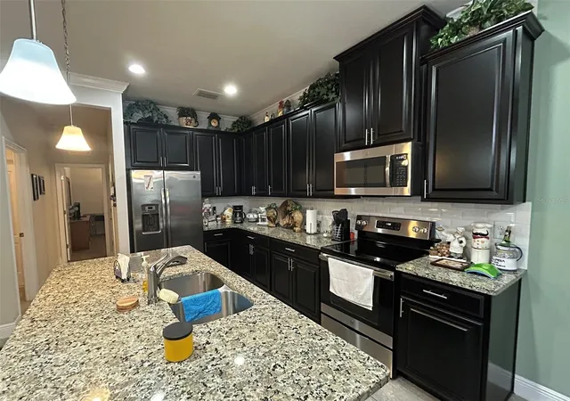 Photo 3 of House for sale at 10647 Heron Hideaway Loop, Land O Lakes, FL 34638 | MLS# TB8467591 | Listing updated on 2026-09-17