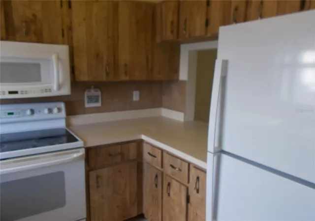 Listing Photo 5 - Condo for sale in building located at 2000 Forrest Nelson Blvd, PORT CHARLOTTE, FL 33952 - Unit #C6