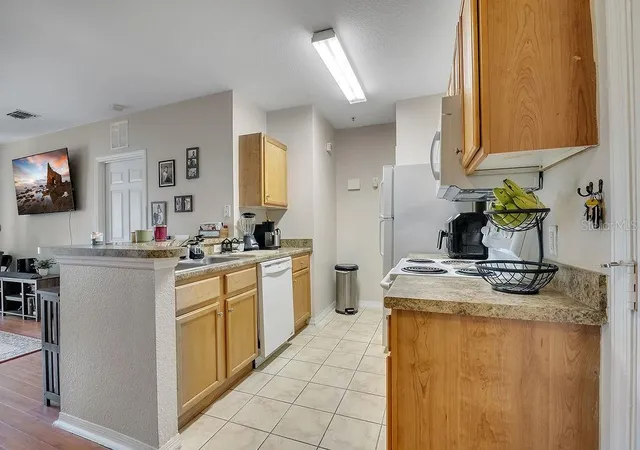 Photo 3 of Condo for sale at 5550 E Michigan St #2114, Orlando, FL 32822 | MLS# O6376306 | Listing updated on 2026-07-29