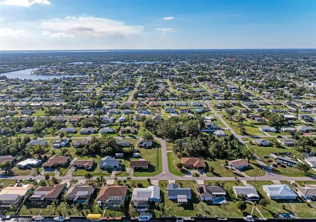 Photo 4 of Single family home for sale at 3332 Elkcam Blvd, Port Charlotte, FL 33952 | MLS# TB8468337 | Listing updated on 2026-07-22