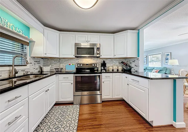 Photo 3 of Manufactured home for sale at 7880 54th Avenue N #54, Saint Petersburg, FL 33709 | MLS# TB8468457 | Listing updated on 2026-09-27