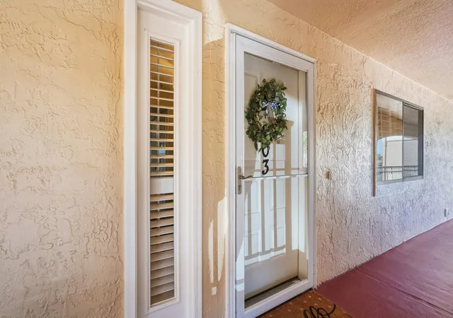 Listing Photo 1 - Condo for sale in building located at 458 Bouchelle Dr, New Smyrna Beach, FL 32169 - Unit #203