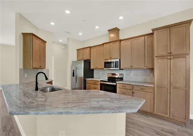 Photo 3 of Single family home for sale at 12085 Harris Hawk Rd, Brooksville, FL 34614 | MLS# TB8469311 | Listing updated on 2026-08-14