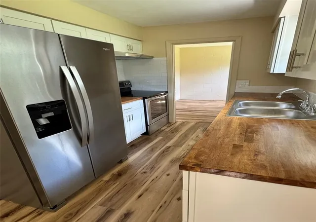 Photo 2 of Single family home for sale at 128 11th Wahneta St W, Winter Haven, FL 33880 | MLS# P4937648 | Listing updated on 2026-09-08