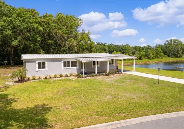 Manufactured home for sale at 302 Ivanhoe Cir, LADY LAKE, FL 32159 | MLS# G5107334