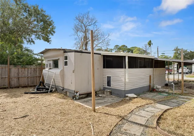 Photo 2 of Manufactured home for sale at 7436 Vagabond Dr, New Port Richey, FL 34652 | MLS# W7882477 | Listing updated on 2026-10-01